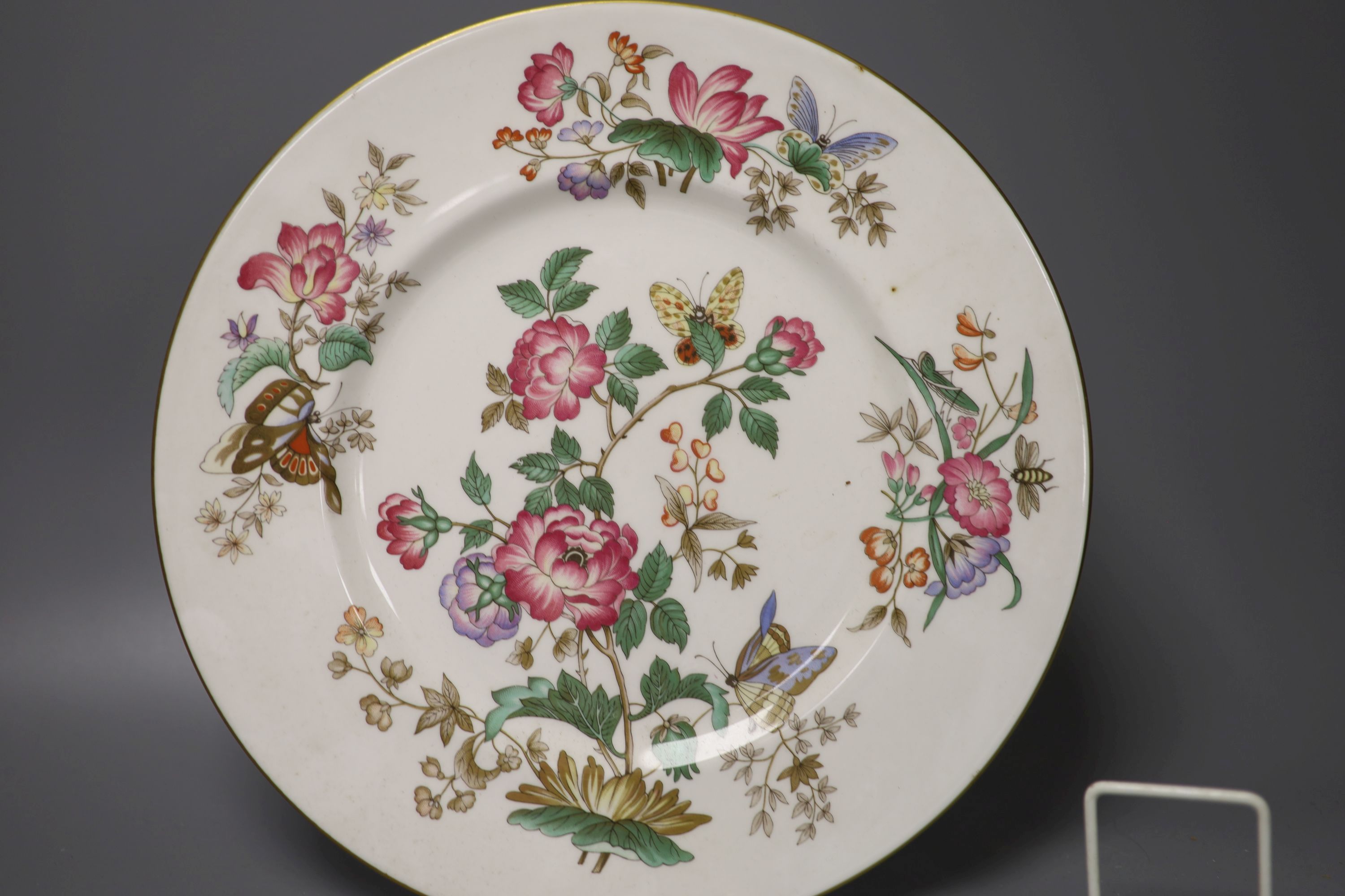 A Spode blue ground bowl, diameter 26cm, two cabinet plates painted with a floral bouquet and a Berlin KPM blue and white vase (4)